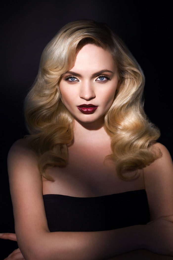 Portrait of glamorous model with red lipstick and classic makeup by Krysten Bryant